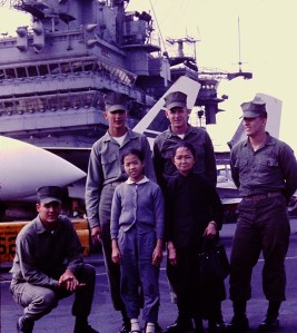 Li Lai Ha and her Marine escorts. - Malcolm R. Campbell photo